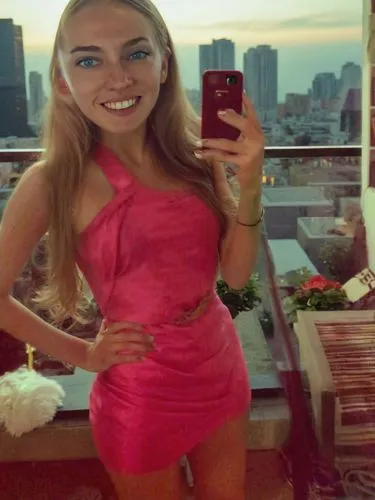 a lady taking a selfie in the middle of the night,pink glasses,petite,bright pink,barbie,blond girl,pink background