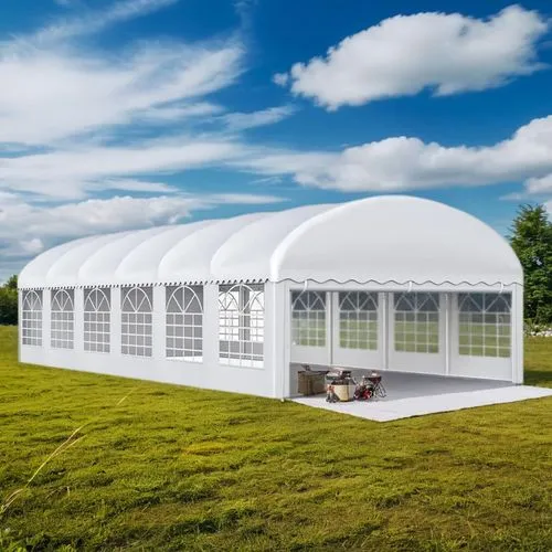 On the grass, blue sky and white clouds,a white outdoor tent that has five walls attached,event tent,large tent,beer tent set,gazebos,indian tent,greenhouse cover
