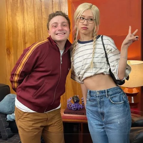a boy and girl standing next to each other,midriff,singer and actress,bellybuttons,tummy,midriffs,vegan icons,nips,icons,bellybutton,fab,bicentennials,outfits,mini,hosts,genes,sustainability icons,spi