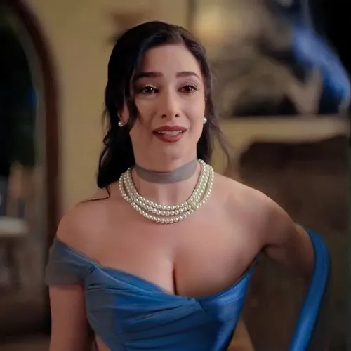 a lady with a pearl necklace and blue dress,jasmine blue,pearl necklace,charmed,bustier,jasmine sky,inamorata,jasmine,bandeau,see through,see thru,necklace,exotica,jasmine bush,sari,latex,commercial,p