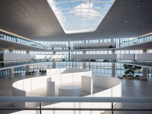 Ultra-realistic futuristic technology exhibition atrium interior, based exactly on the provided architectural massing and spatial layout, preserve the same multi-level circular atrium geometry, balcon