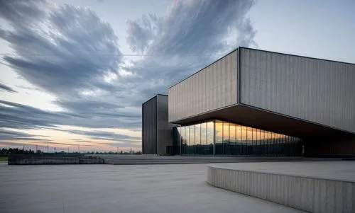 at dusk,christ chapel,tempodrom,chancellery,autostadt wolfsburg,glass facade,performing arts center,archidaily,futuristic art museum,the observation deck,brutalist architecture,modern architecture,obs
