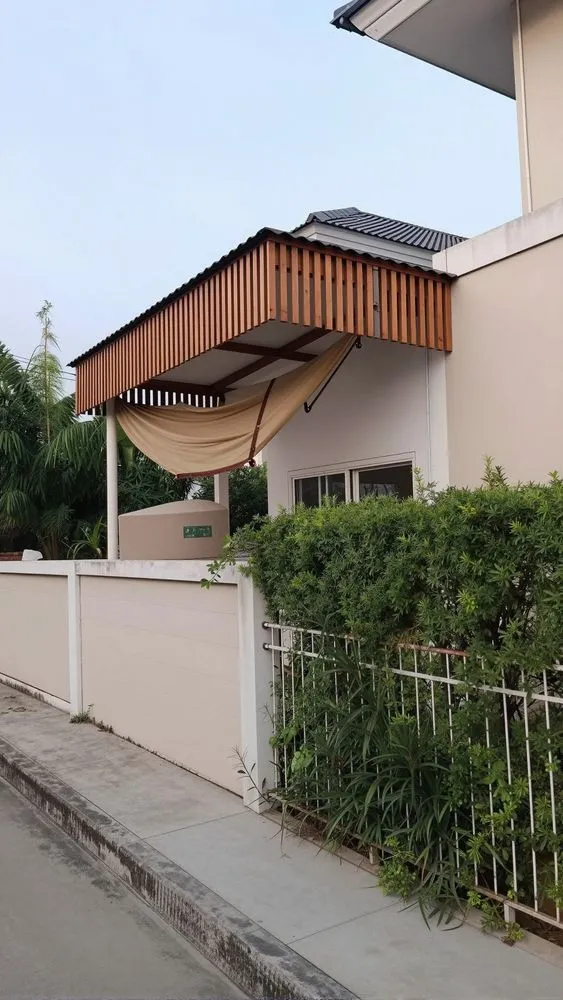 a brown shade covering the front of a house