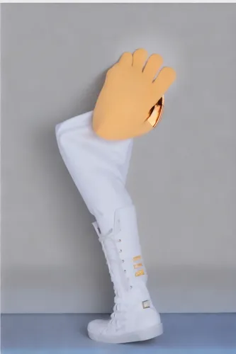 a white shoe with yellow colored foot is shown with an unusual light attached to the bottom,foot model,sports sock,pant,toe,foot,bobby socks