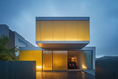 an entrance is lit with lighting near a building,cubic house,cube house,residential house,modern architecture,modern house,dunes house,cube stilt houses,cantilevers,cantilevered,residential,frame hous
