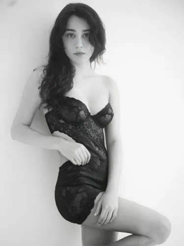Naked black and white,a woman poses against the wall in a lingerie,photo session in bodysuit,black and white photo,black and white,black and lace,in black,nightgown,elegant,corseted,color black and wh