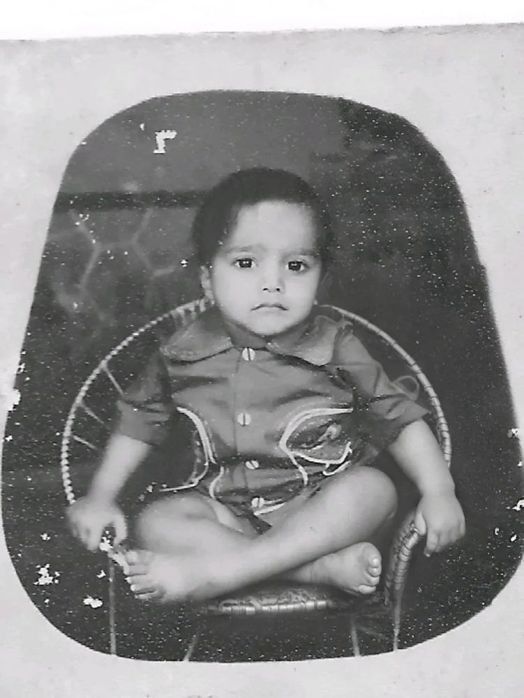 the is posing for a po in his chair