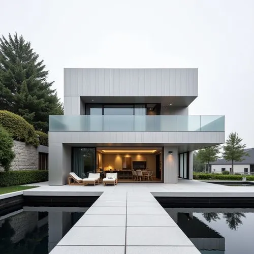  ,the house is located within an individual complex,modern house,modern architecture,cube house,glass wall,cubic house,luxury home,glass facade,dreamhouse,residential house,beautiful home,pool house,l