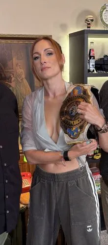 Naked,a women who has a wrestling belt,tortoises,stacked turtles,anacondas,snakebites,tortoise,turtle,anaconda,poppycock,ammo,green screen,choke snake,breasted,cockle,ball python,turtle tower,cocked,g