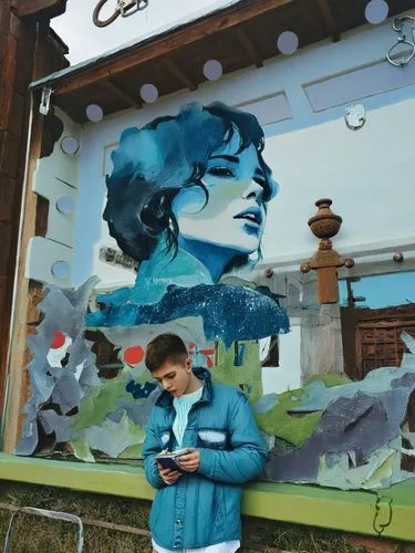a man is looking at his cell phone,mural,calypsos,woman with ice-cream,diorama,murals,aquariums