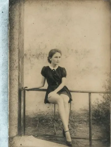 Memories of the good old days,an old photo of a young woman sitting on a rail,tintype,vintage female portrait,woman sitting,tintypes,girl sitting,vintage photo,vintage girl,vintage woman,young girl,yo