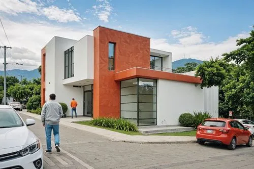 A photo-realistic rendering of a modern two-story building with a combination of white and orange colors. the building has a rectangular shape with a flat roof and large windows on both sides. The ext