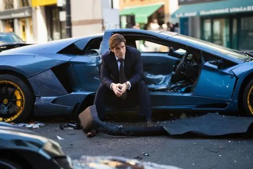 A crashed Lamborghini parked on a city street. Glass is strewn all over the place.,a man in a suit sitting on the side of a car with it's doors open,car crash,wallstreet,car wreck,battista,lambo,ferra
