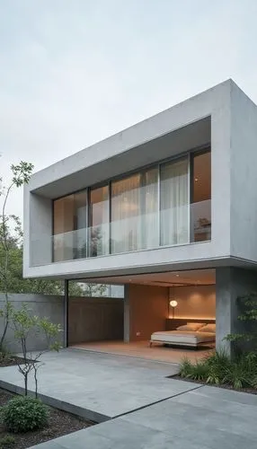 house,a concrete house sits next to an open area,modern house,modern architecture,dunes house,cube house,exposed concrete,cubic house,residential house,cantilevered,cantilevers,contemporary,frame hous