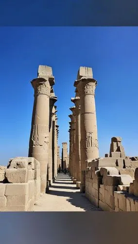 some big tall stone pillars near one another,pillar capitals,ancient buildings,ancient city,palatals,ancient civilization,caryatids