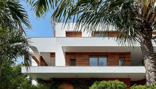 sala  de estar vazia,a white and wooden house in the daytime,dunes house,beach house,tropical house,holiday villa,modern house,modern architecture
