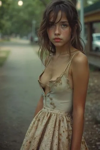 a very cute girl in a dress with an odd look on her face,torn dress,young woman,a girl in a dress,young girl,dirndl,girl in a long dress,pretty young woman,beautiful young woman,belle,teen,vintage ang