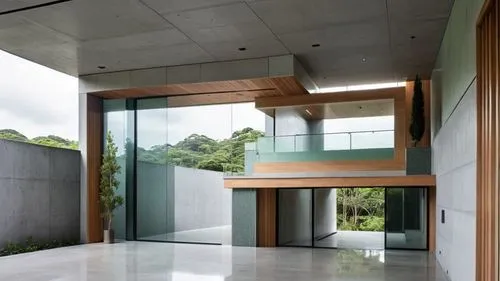 modern design of architecture sits on large tiles in front of trees,cantilevered,cubic house,glass wall,mirror house,structural glass,cantilevers,exposed concrete,concrete ceiling,cube house,modern ho