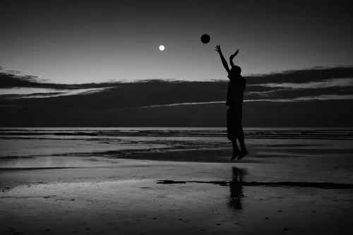 silhouette dancer,arms outstretched,dance silhouette,dark beach,woman silhouette,the night of kupala,sillhouette,silhouette of man,man at the sea,monochrome photography,silhouette against the sky,juggler,reaching,moonrise,moonlit,blackandwhitephotography,moonlit night,mermaid silhouette,equilibrist,hanging moon,Photography,Black and white photography,Black and White Photography 01