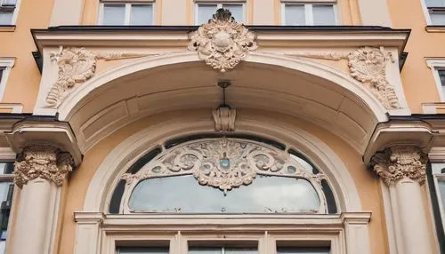 Baroque style building, Lithuanian cultural heritage, ornate facade, grand entrance, curved lines, decorative columns, intricate stone carvings, stained glass windows, Gothic influences, Vilnius Old T