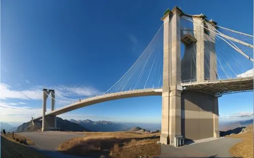 a bridge and road bridge surrounded by mountains,cable-stayed bridge,puente,the akashi-kaikyo bridge,akashi-kaikyo bridge,viaducto,suspension bridge,Photography,General,Realistic