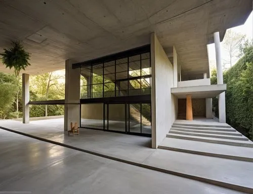 a concrete walkway leading to the side of a building,seidler,exposed concrete,corbu,breuer,caltech,gulbenkian,neutra,skirball,modern house,concrete ceiling,mid century modern,mid century house,dunes h