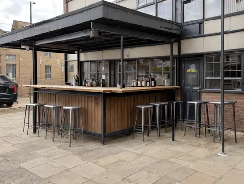 add a small kitchen and bar  to sell sandwiches and buy drinks for university students with some seating don't change the essential building  
,beer tables,beer garden,beer table sets,paving slabs,bar