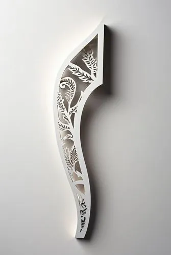 A table leg made of iron against a white background,a white and gray decorative object on a wall,wall lamp,bookmark with flowers,floral silhouette frame,the laser cuts,paper art,lalique,Unique,Paper C