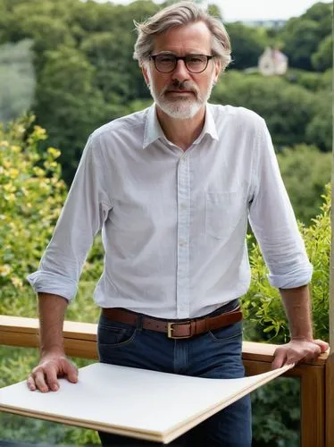 Middle-aged man, architectural designer, Lewes, England, bespectacled, stylish hair, light stubble, white shirt, rolled up sleeves, dark blue jeans, brown leather belt, black dress shoes, holding larg