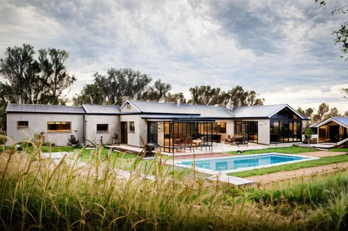 dunes house,holiday home,eco hotel,holiday villa,timber house,modern house,pool house,inverted cottage,landscape designers sydney,frisian house,landscape design sydney,summer cottage,mid century house