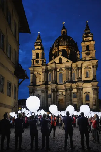 Activists of the international campaigning and advocacy organization ONE install illuminated balloons with portraits of the G7 heads of state in front of the Frauenkirche cathedral (Church of Our Lady