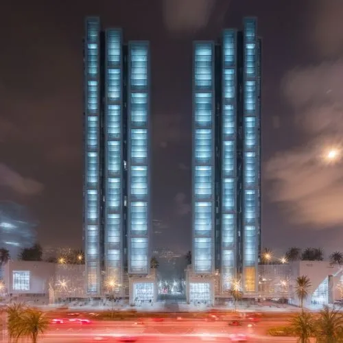 two tall buildings at night with palm trees,urban towers,tower block,international towers,mgimo,condos,hurontario,Photography,Artistic Photography,Artistic Photography 04