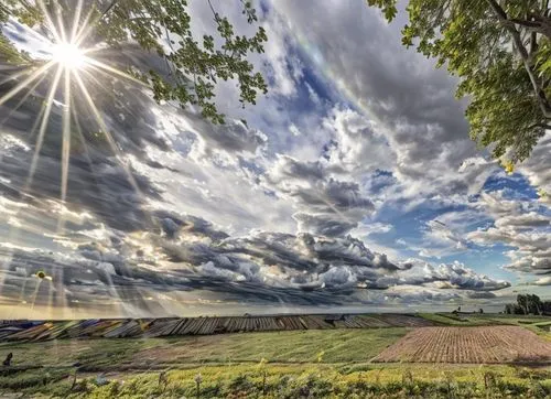 tuscany,provence,sun through the clouds,farm landscape,rural landscape,sun in the clouds,sunbeams protruding through clouds,sunrays,sun rays,god rays,sunbeams,solar field,rays of the sun,beautiful landscape,nature landscape,sunray,landscape photography,sun reflection,meadow landscape,home landscape