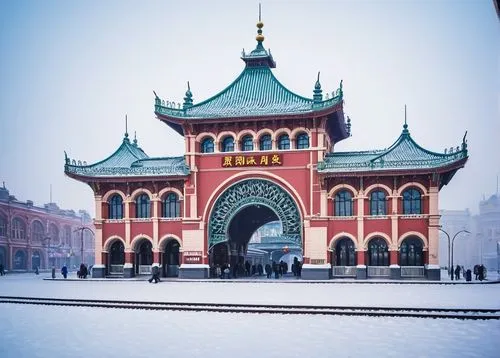 Harbin Western Railway Station, morning time, cold winter atmosphere, snowflakes gently falling, historic Russian-inspired architecture, intricate details on building facade, grand clock tower, massiv