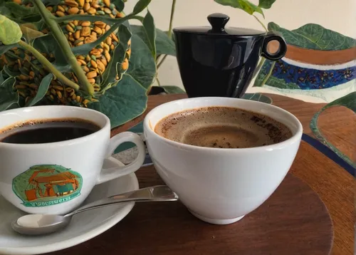 Enjoying a cozy morning with aromatic coffee grinds,jamaican blue mountain coffee,single-origin coffee,cuban espresso,kopi luwak,turkish coffee,kona coffee,caffè americano,indian filter coffee,kopi tu