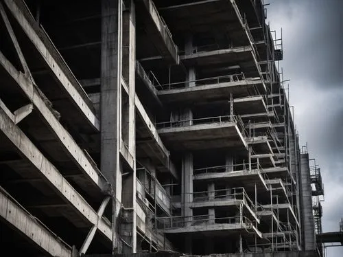 Raw concrete architecture, modern brutalist style, minimalist aesthetic, rugged texture, rough edges, industrial atmosphere, urban setting, cityscape background, dramatic lighting, low-angle shot, str