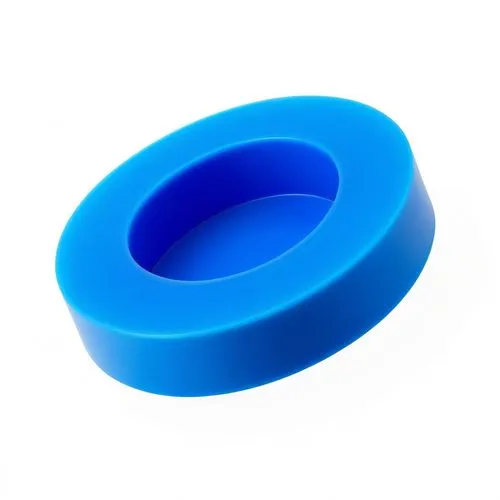 there is a large blue ring on a white table,inflatable ring,mouthguard,extension ring,circular ring,swim ring,finger ring