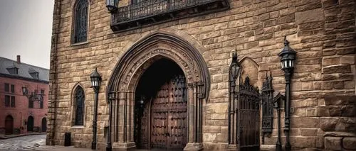 Historic architectural artifacts, Toledo OH, ancient stone walls, Gothic style, intricate carvings, stained glass windows, grand entrance doors, ornate columns, rusty iron gates, weathered bronze stat