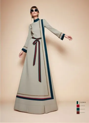 a woman wearing a grey dress with an embroidered collar,homogenic,folk costume,cassock,cassocks,abaya,hanbok,Photography,Fashion Photography,Fashion Photography 10