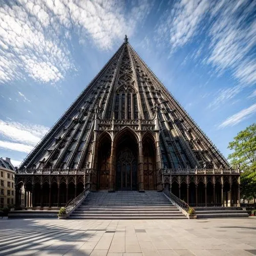 this building is constructed up of large, stone columns,nidaros cathedral,voortrekkers,voortrekker,basiliensis,sagrada,prambanan,Architecture,Commercial Building,European Traditional,Spanish Gothic