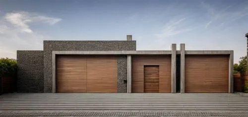 residential house,modern house,dunes house,iranian architecture,build by mirza golam pir,wooden facade,persian architecture,garage door,the threshold of the house,timber house,modern architecture,house entrance,private house,concrete blocks,archidaily,house shape,contemporary,landscape design sydney,house front,stucco wall,Architecture,Villa Residence,Modern,Mid-Century Modern