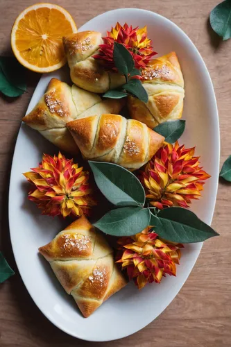 Create a delightful surprise with these stuffed doughbriks.,saffron bun,yellow leaf pie,edible parrots,mandarin cake,empanadas,cuban pastry,mini croissants,easter pastries,butter rolls,pastries,fruit-