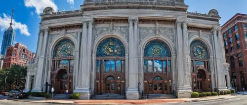 Atlanta, GA, Hurt Building, historic landmark, Beaux-Arts style, grandiose entrance, ornate details, marble columns, intricate stone carvings, symmetrical façade, clock tower, domed roof, stained glas