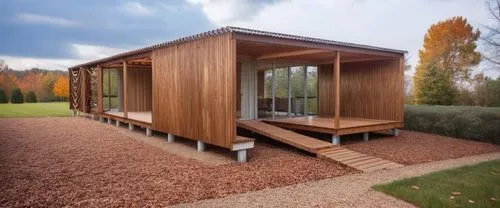 corten steel,timber house,cubic house,inverted cottage,cube house,wooden house,wooden sauna,wooden decking,prefabricated buildings,dunes house,wood doghouse,summer house,wooden hut,holiday home,frame house,small cabin,eco-construction,folding roof,archidaily,modern house