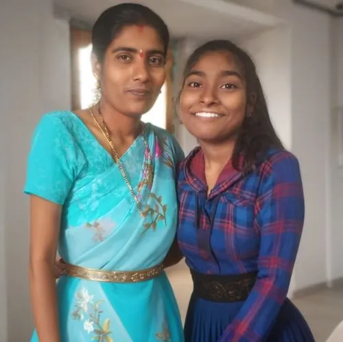 two women smiling next to each other,sindhu,bhargavi,abhinaya,thamarai,akhila,pragathi