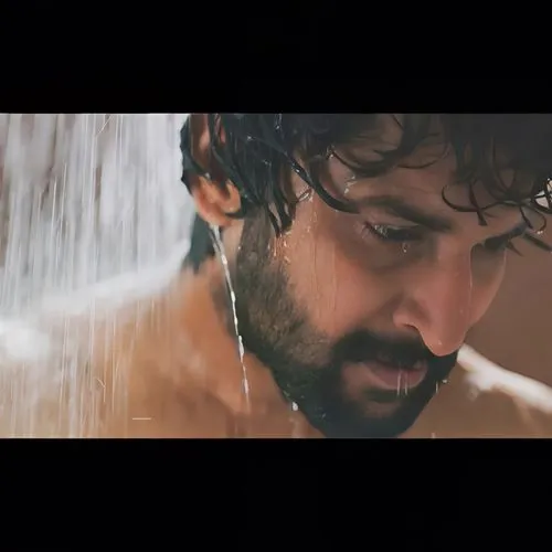 kabir,spark of shower,video scene,golden rain,ramanguli,mass,kerala,chitranna,film actor,photoshoot with water,video film,in water,immersed,cinematic,sagar,cinematography,beautiful frame,wet,rain shower,monsoon