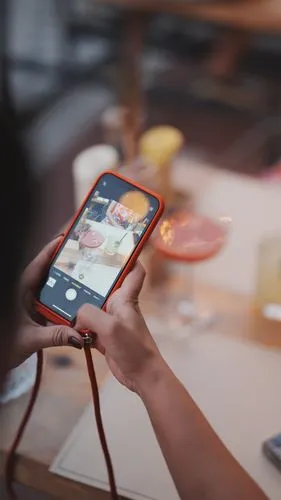 mobile payment,square bokeh,woman holding a smartphone,corona app,payment terminal,electronic payments,mobile application,augmented reality,the app on phone,tabletop photography,display advertising,di