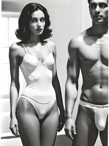 Same scene as black and white photo.,a man and woman in underwear pose for a magazine cover,vintage man and woman,model years 1960-63,vintage boy and girl,feldshuh,jean simmons-hollywood,model years 1