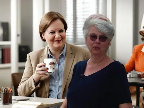 Claudia as a guest of the Chief of the Factory,woman drinking coffee,secretariats,toksvig,cafemom,paraprofessionals,woman holding a smartphone,secretarial,koffiekamp,dinnerladies,hetty,holby,ahrendts,