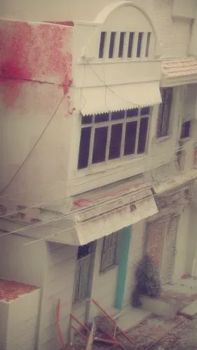 a model house is white with red paint on the outside,hospicio,asylum,martyr village,homs,hathseput mortuary,ballygunge,Photography,Artistic Photography,Artistic Photography 05